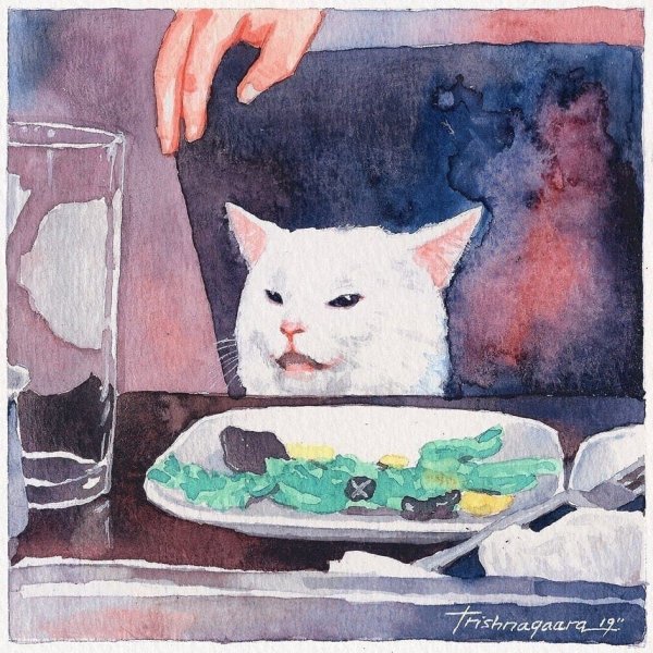 Кот за столом