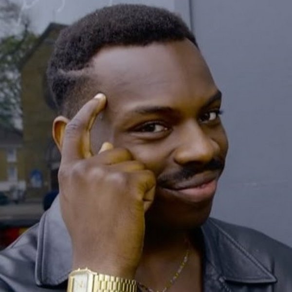 Негр с пальцем у Виска