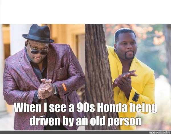 Негр в жёлтом пиджаке потирает руки