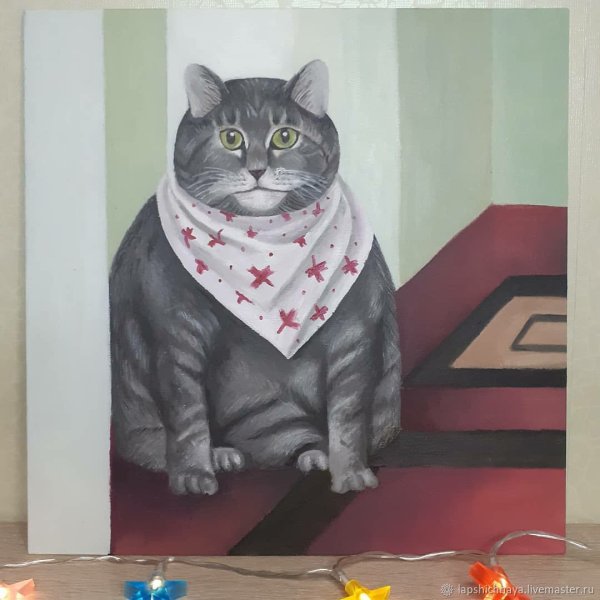 Толстый кот в слюнявчике