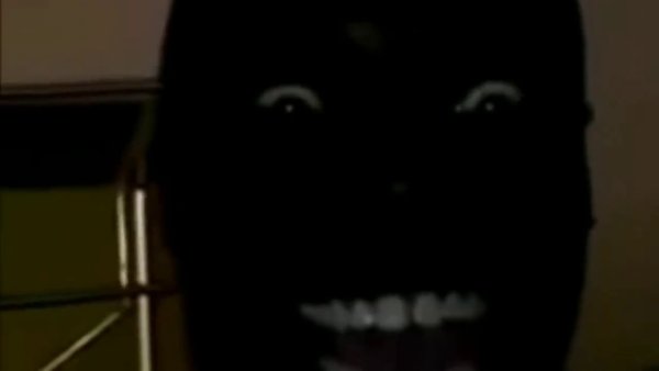 Улыбка негра в темноте