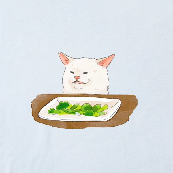 Белый кот за столом