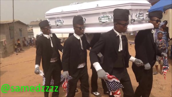 Негры с гробом