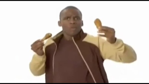 Танцующий негр с курицей