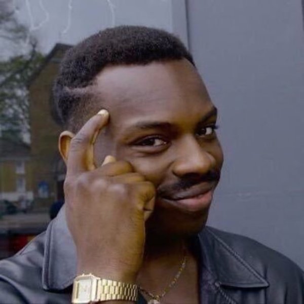 Негр с пальцем у Виска