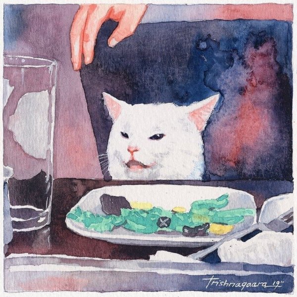 Кот за столом