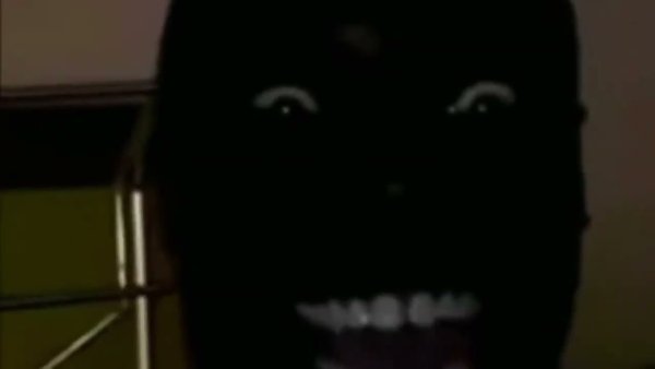 Глаза негра в темноте