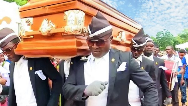 Мем с неграми и гробом