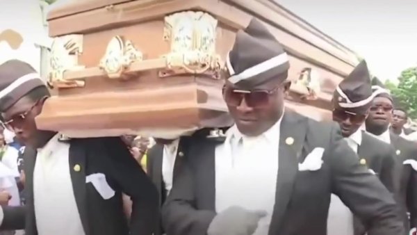 Негры с гробом