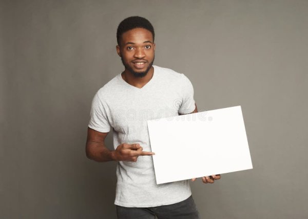 Чернокожий с табличкой