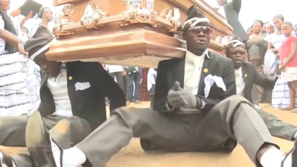 Афроамериканцы танцуют с гробом