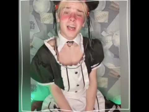 Мальчик в костюме горничной