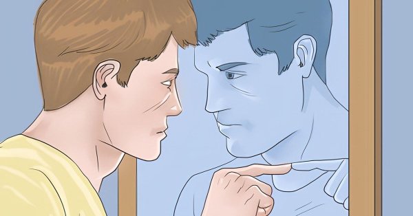 Человек тычет в зеркало