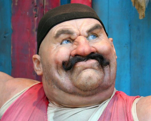 Толстый человек с усами