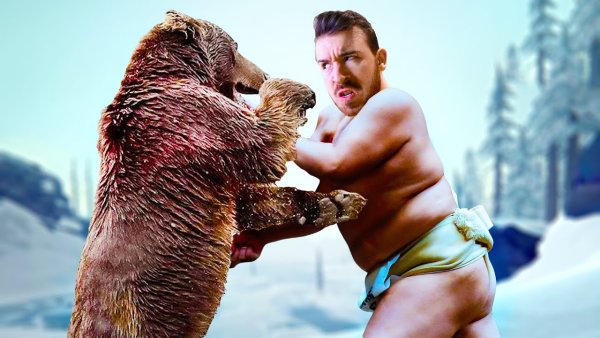 Человек сражается с медведем