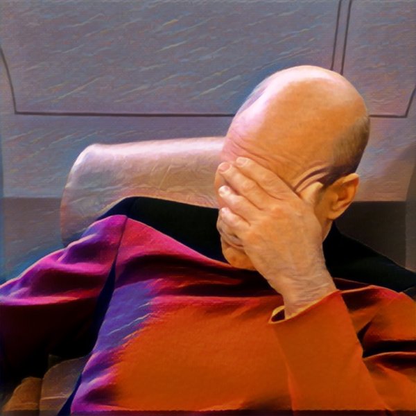 Мужик закрывает лицо ладонью