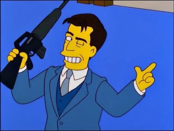 Подмигивает и показывает пальцем