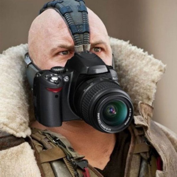 Человек с фотоаппаратом