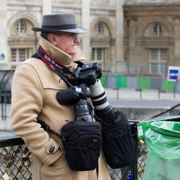 Человек с фотоаппаратом