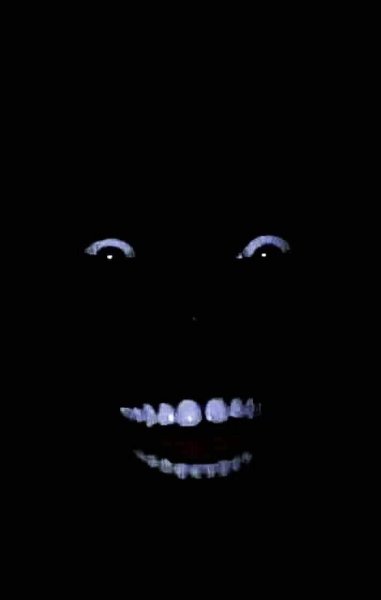 Улыбка негра в темноте