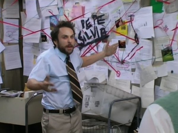 Человек у доски объясняет