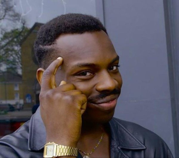 Мем негр с пальцем у Виска