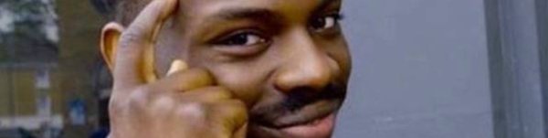 Чернокожий с пальцем у Виска