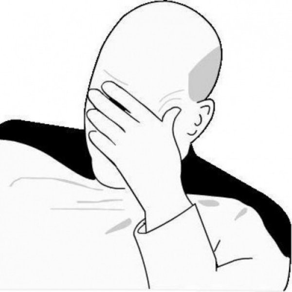 Прикрывает лицо рукой