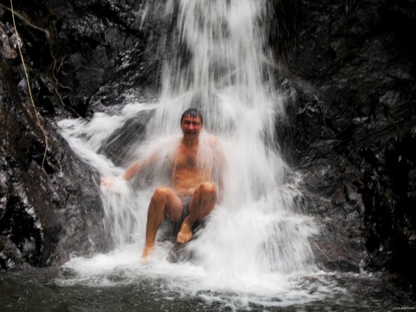 Под водопадом