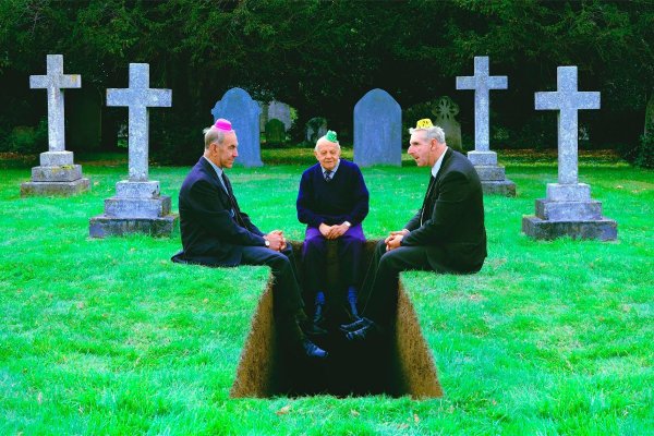 Веселый человек на кладбище