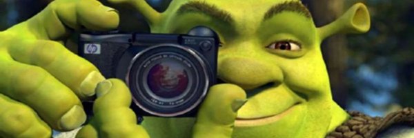Шрек с фотоаппаратом