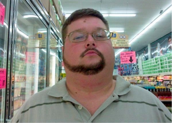 Жирный мужчина с усами