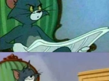 Кот том с газетой