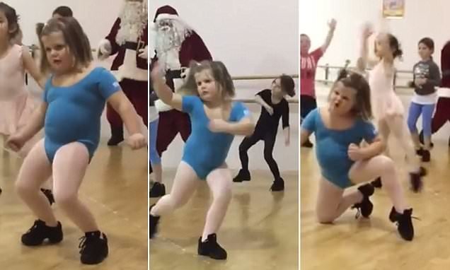 Смешная девочка танцует