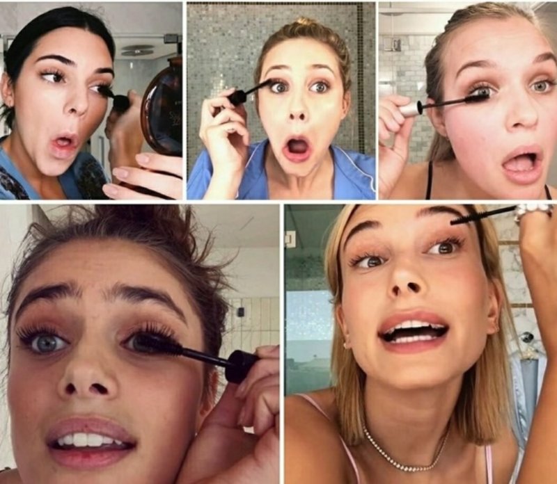 Девушка красит ресницы