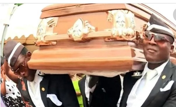 Мем с темнокожими и гробом