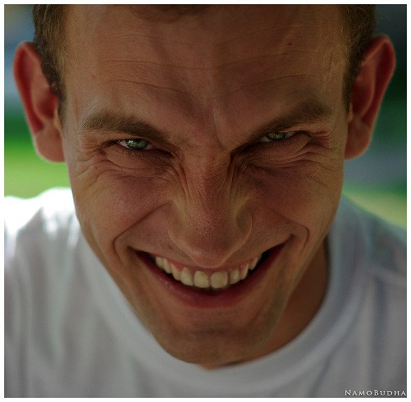 Хитрая улыбка