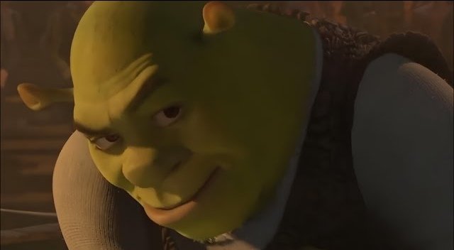 Шрек ехидно улыбается