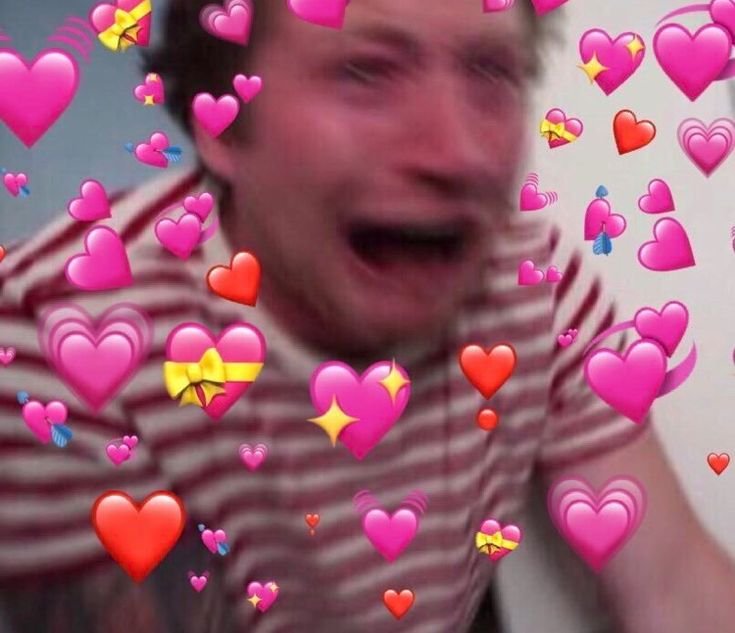 Плачущий сердечками человек