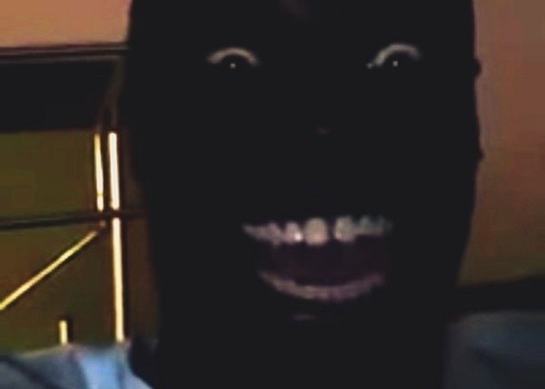 Негр в темноте