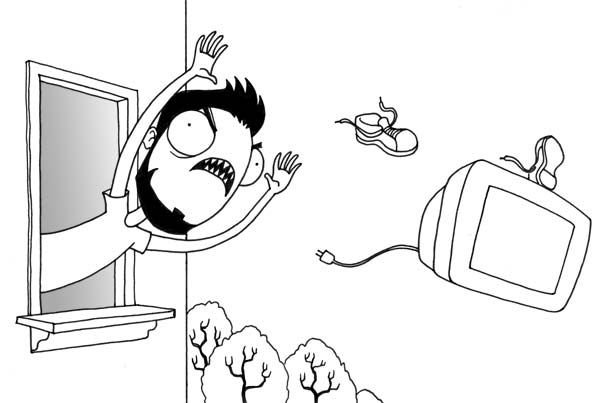 Человек выкидывает компьютер в окно