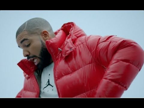 Дрейк рэпер в оранжевой куртке