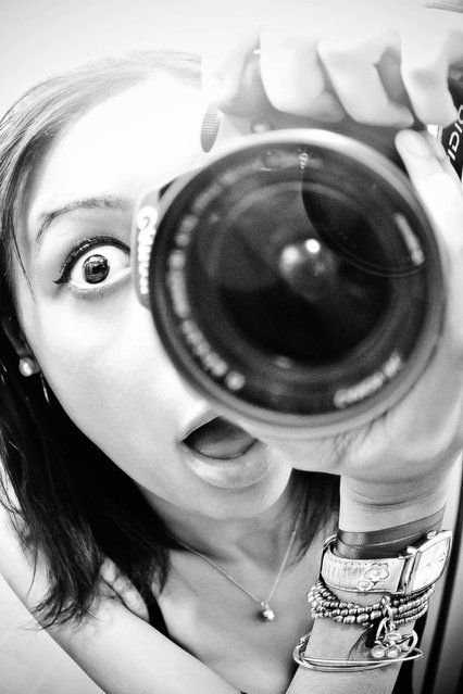 Девушка с фотокамерой
