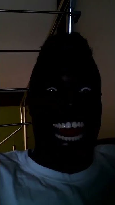 Негр в темноте