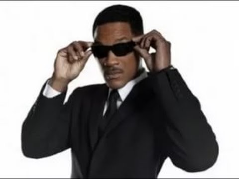 Люди в черном в очках