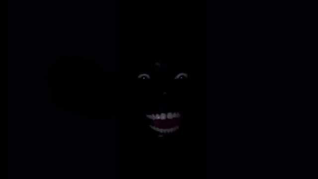 Негр в темноте