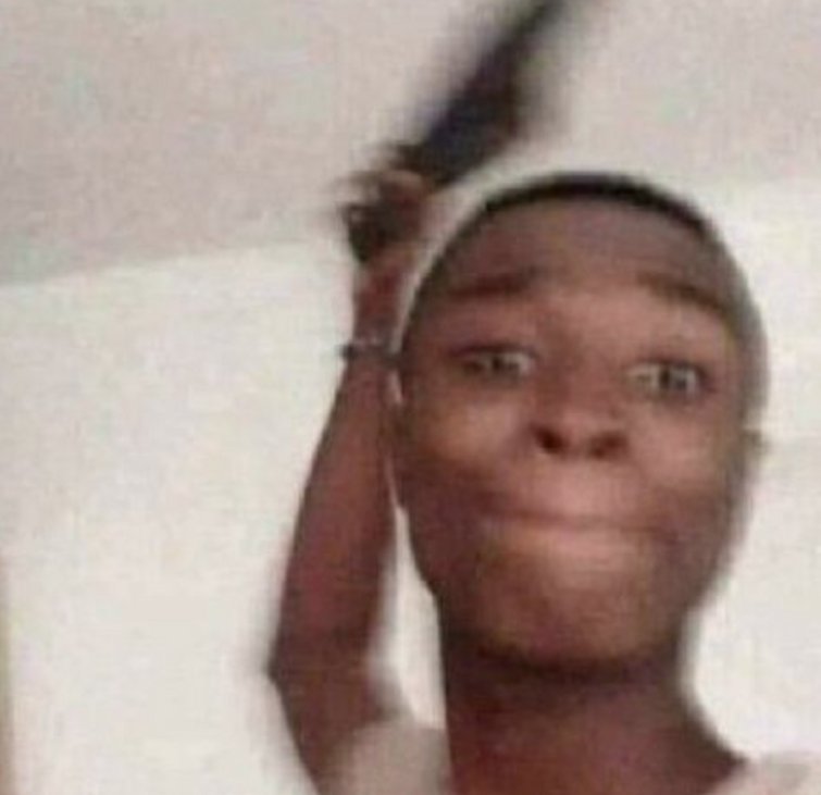 Афроамериканец с тапком