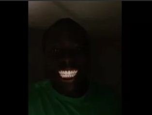 Негр в темноте