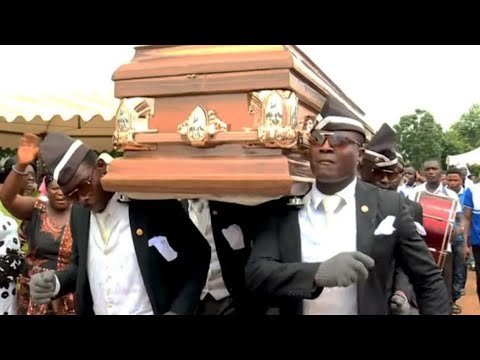 Негры несут гроб