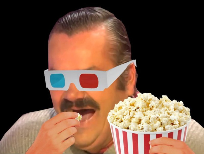 Мужик в очках с попкорном